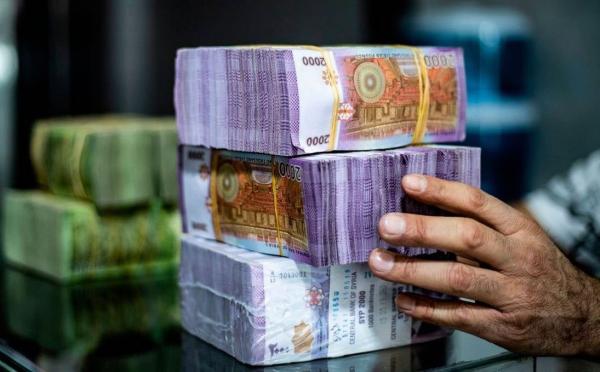 مرسوم بزيادة 200 بالمئة إلى رواتب العاملين في الدولة